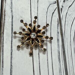 Gold and Black Rhinestone Starburst Brooch